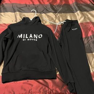 Authentic jumpsuit milano.sz small but runs big.Worn 1X excellent condition.